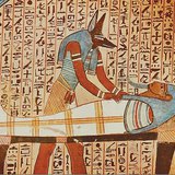 Anubis, Bog s glavom šakala mumificira faraona
