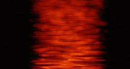 Odraz zalazećeg Sunca u vodi